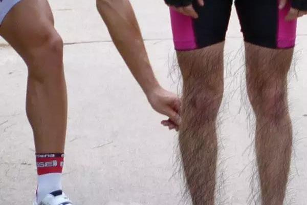 professional mountain bike rider has leg hair